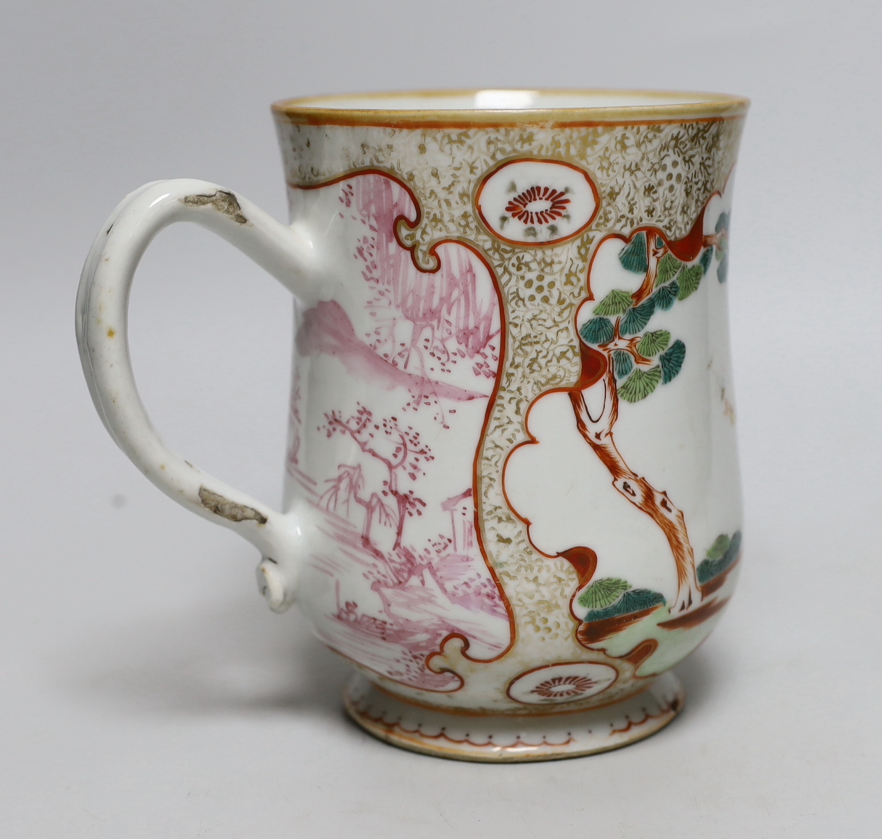 An 18th century Chinese export famille rose mug, 15.5cm high